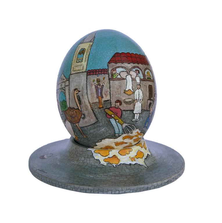 Egg decorated with a lively town square scene, featuring chefs, an ostrich and a big painted omelette flowing out at the base.