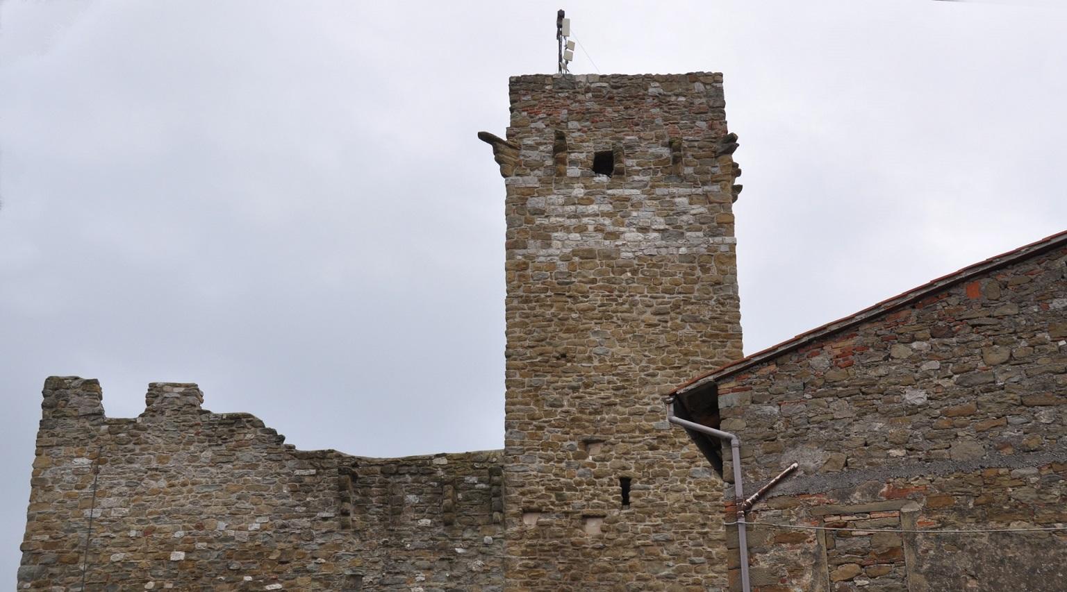 Panoramic view of the ancient torrione of the Rocca, majestically rising from its ancient walls.