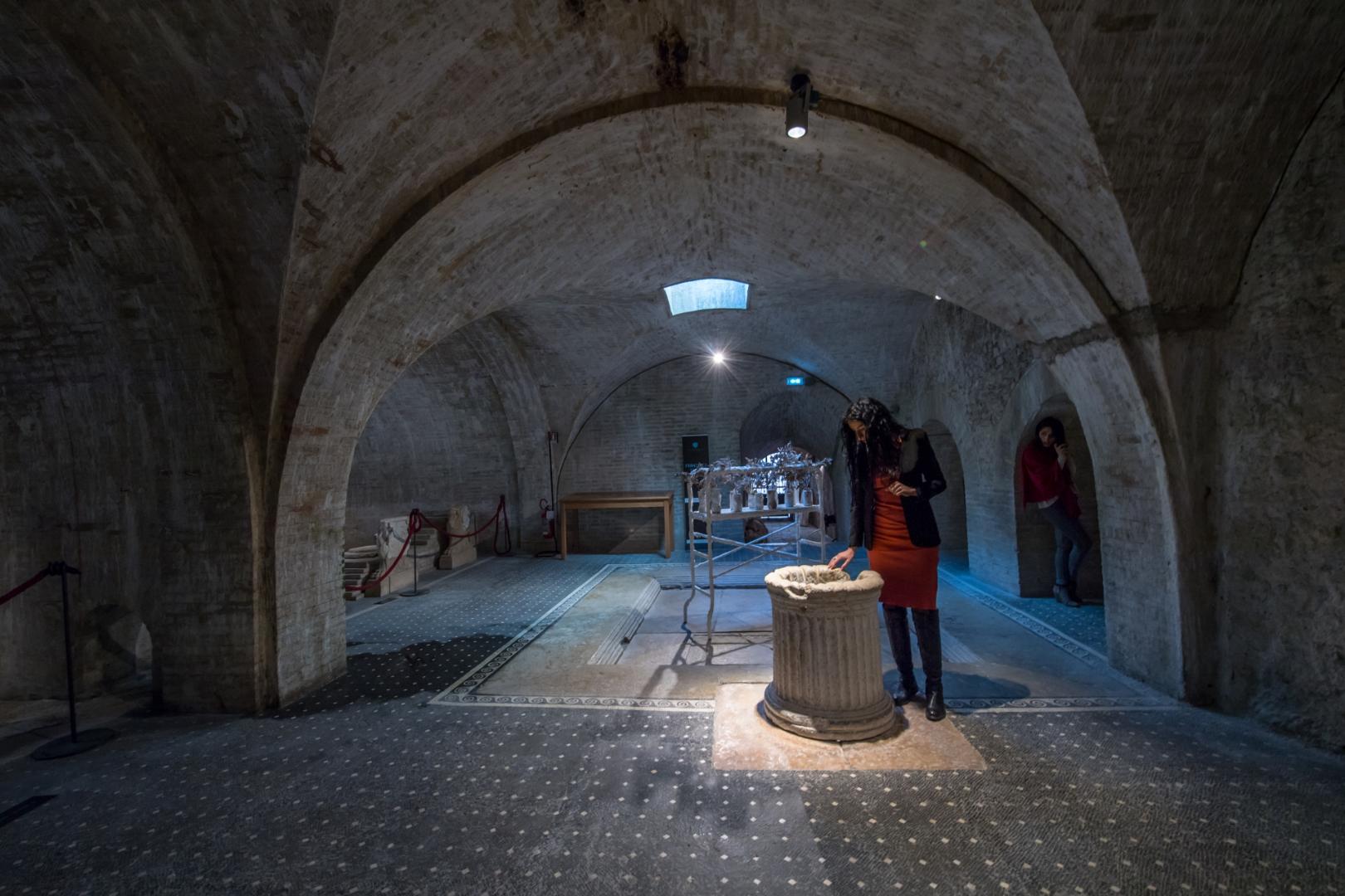 View of the interior of the Roman house in Spoleto, with the well mouth near the impluvium and the mosaic floor