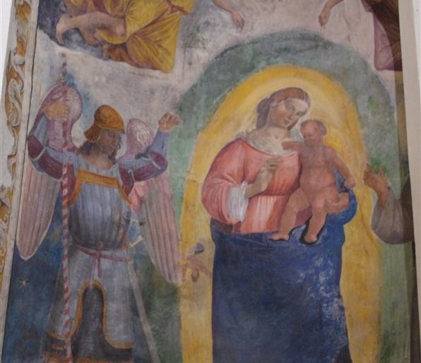 Virgin and Child between Saints Michael the Archangel and Francis.