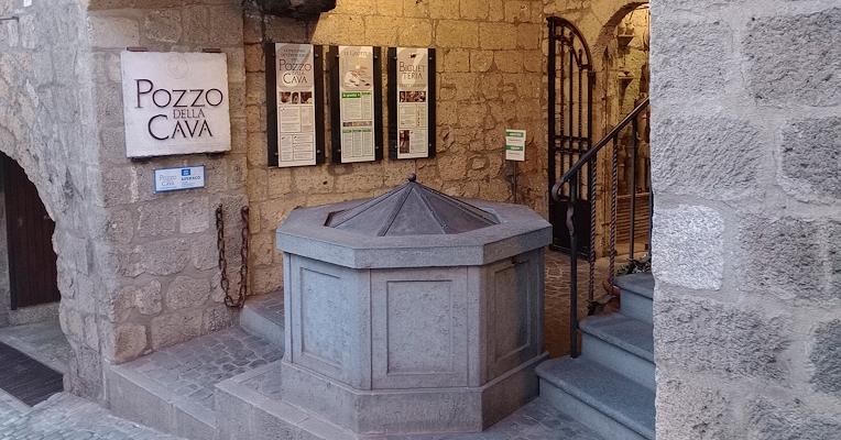 Entrance to Pozzo della Cava with the UNESCO recognition sign