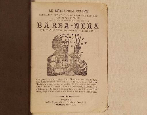 Cover of an 1872 Barbanera almanac with illustration of a bearded man, stars and astrological instruments.