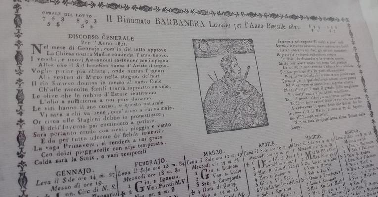 Reproduction of a 1762 Barbanera almanac with monthly calendar, astrological forecasts and decorative illustrations.