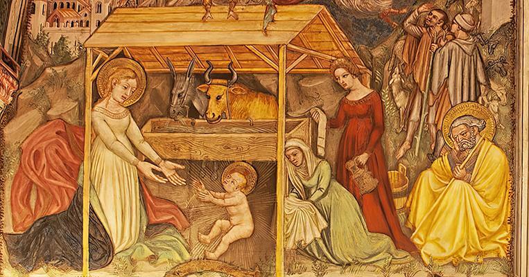 Fresco with a Nativity scene, with the Virgin Mary and  Jesus before the ox and the donkey in a wooden hut, and Saint Joseph in a bright yellow robe.